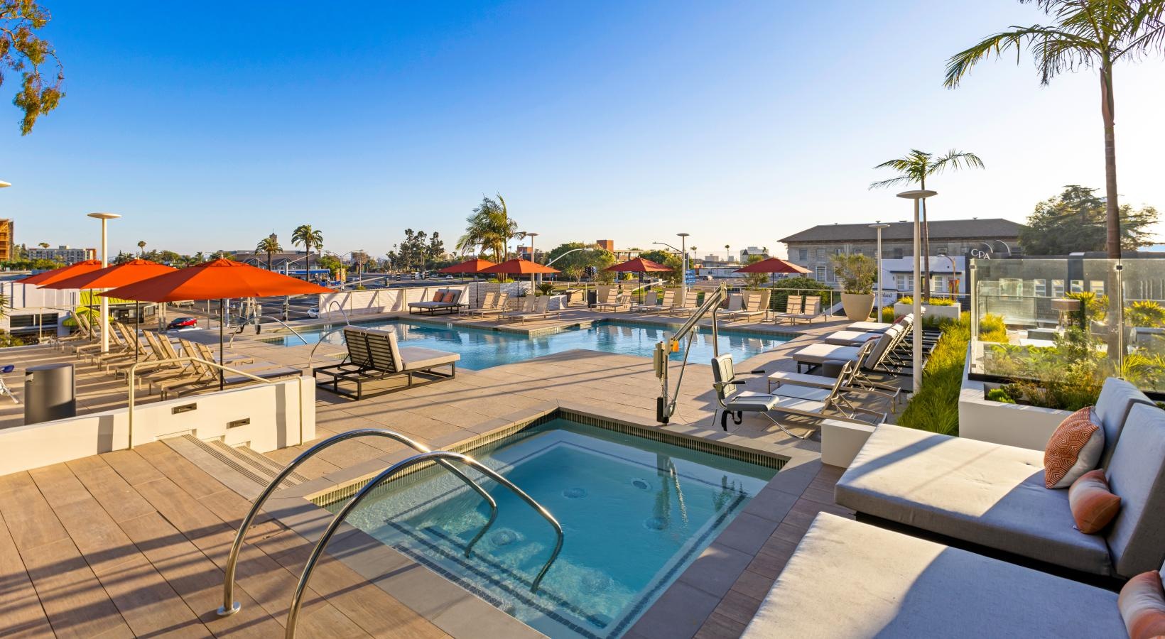 Everything within reach Resort-style swimming pool with lounge seating