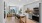 a kitchen with a dining table