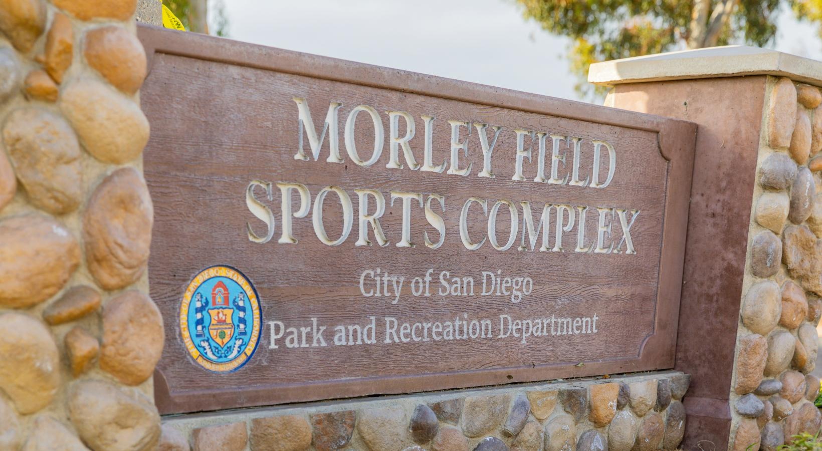 The essence of exceptional living a park sign