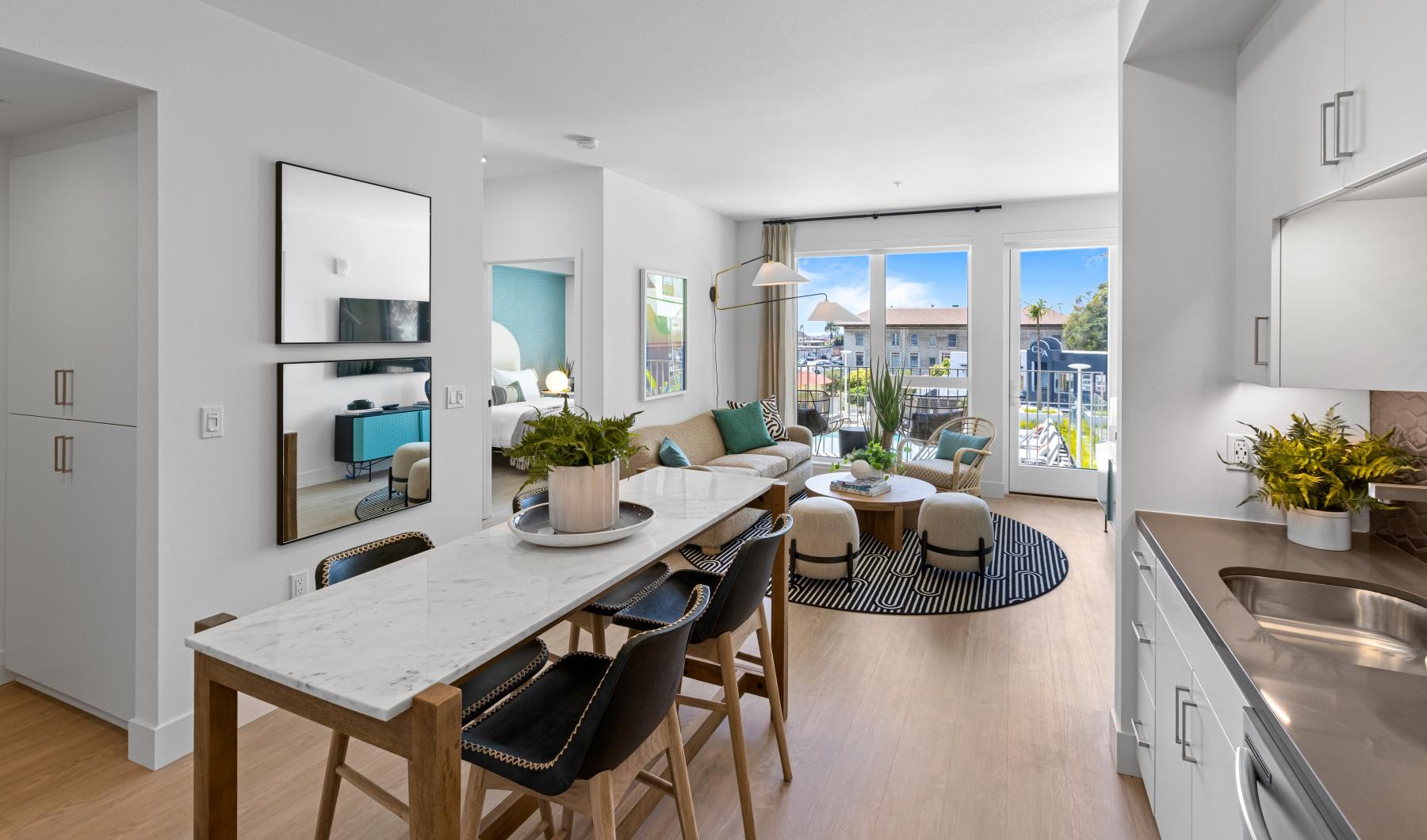 Settle into comfort at Winslow a kitchen with a dining table