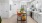 a kitchen with white cabinets