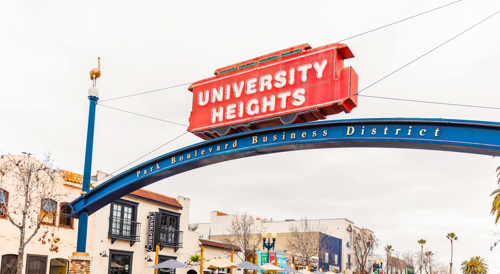 The essence of exceptional living a large sign over a street