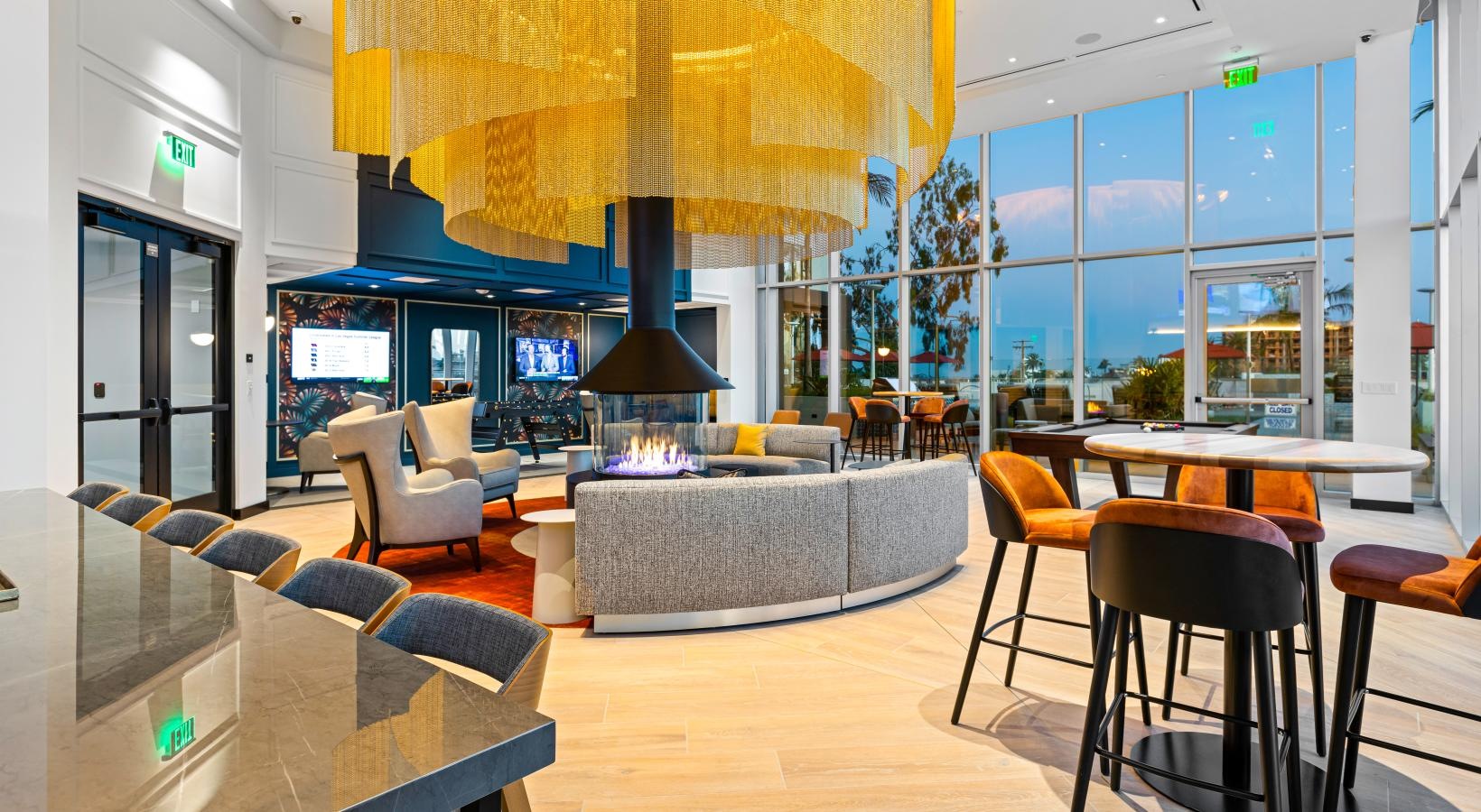 Everything within reach a room with tables and chairs