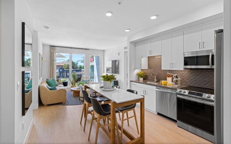a kitchen with a dining table