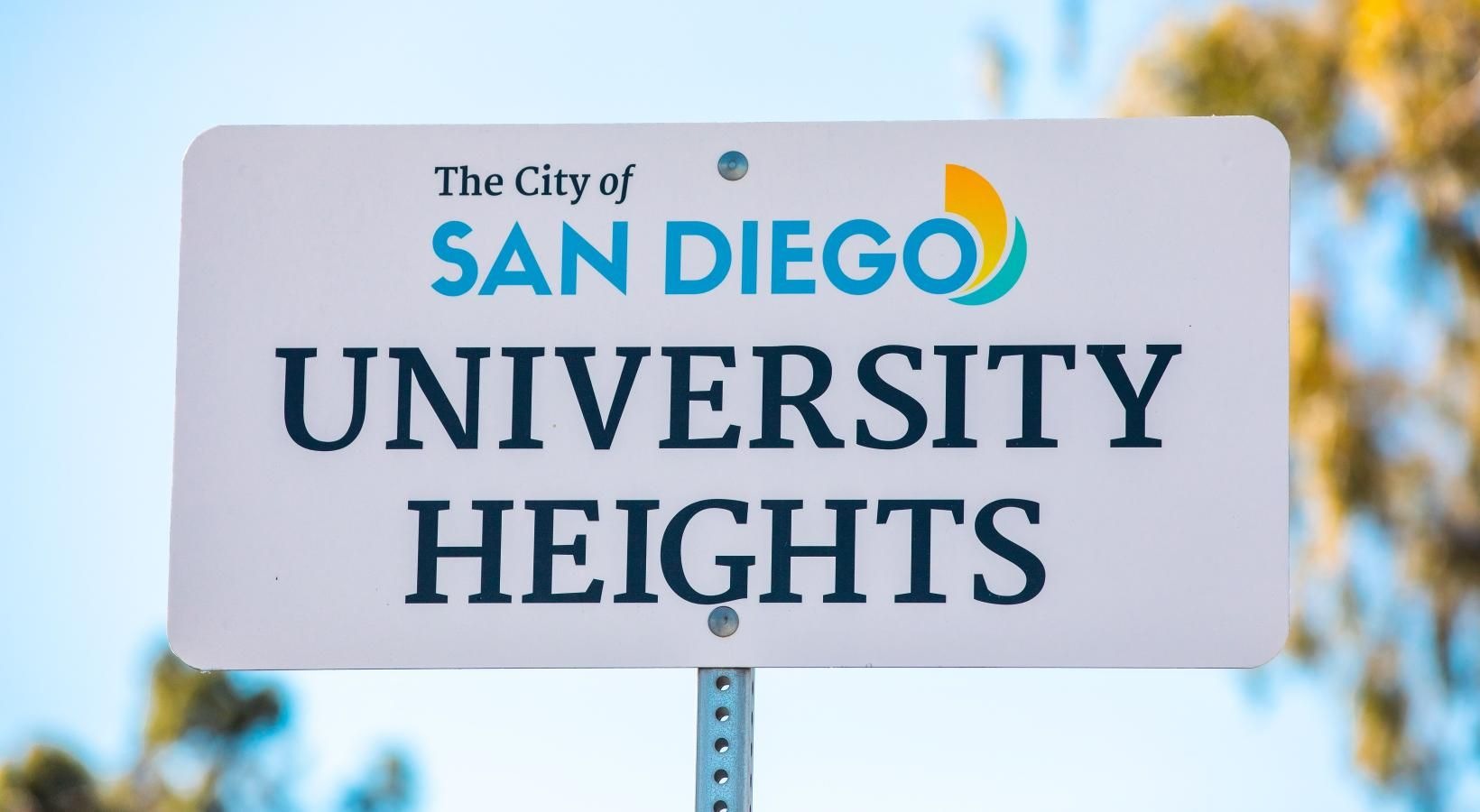 The essence of exceptional living a local sign for University Heights San Diego