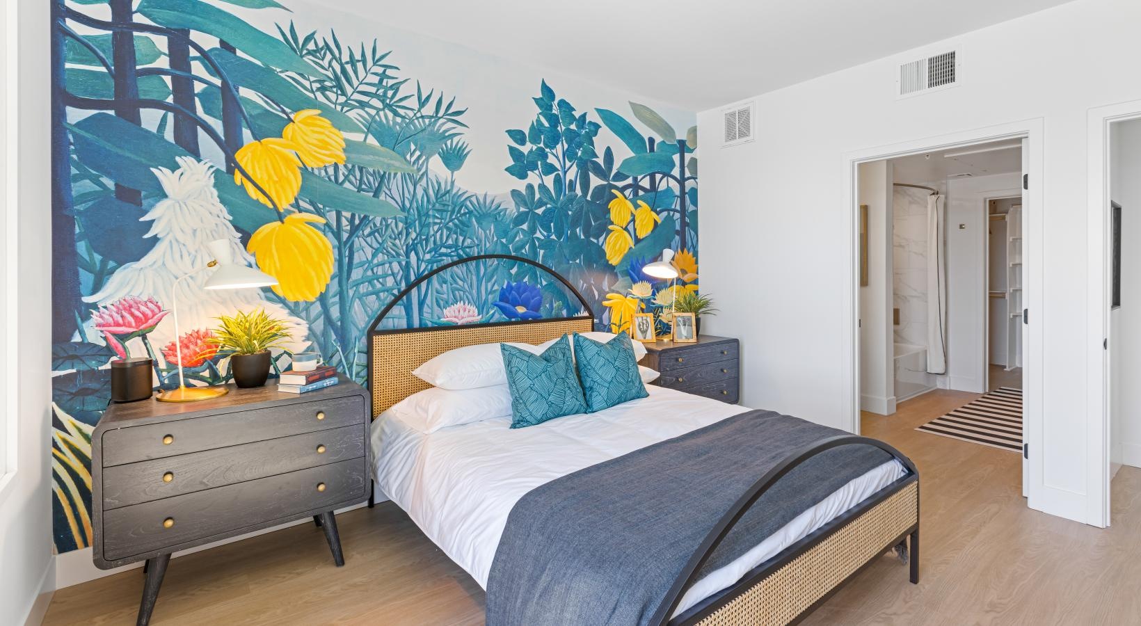 Sleep in style a bedroom with a painting on the wall