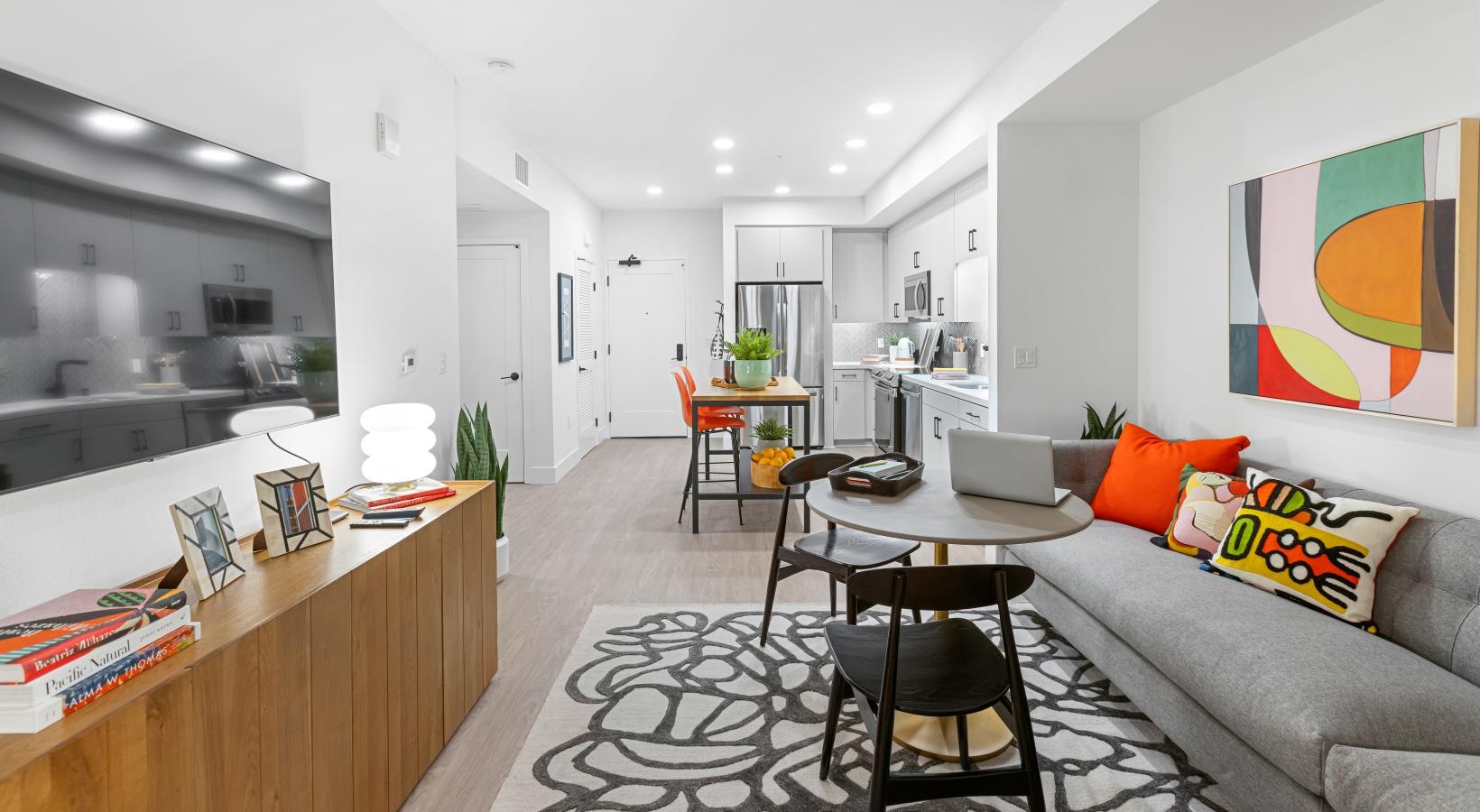 Generous living spaces to relax and unwind a living room with a couch and a table