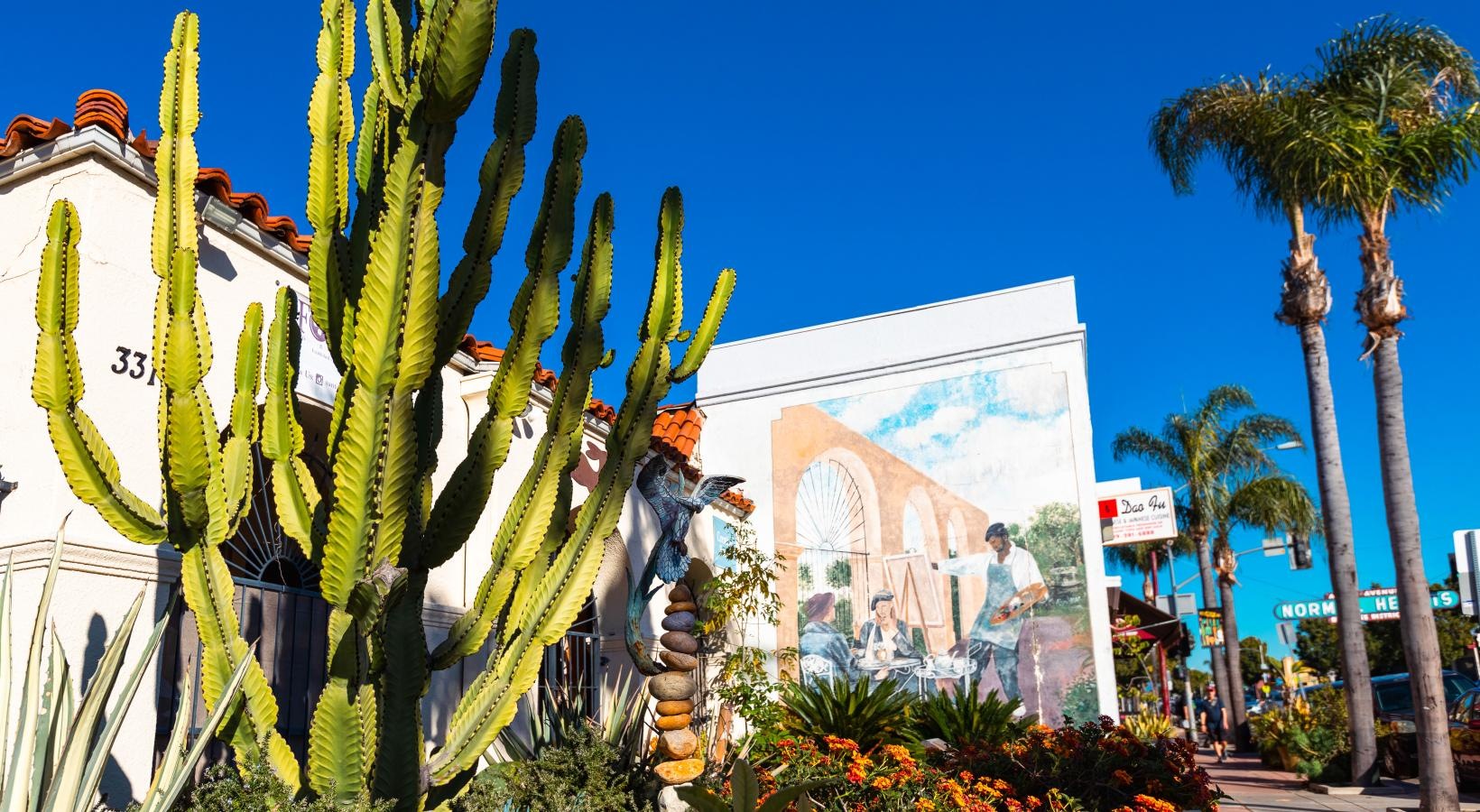 Settle into comfort at Winslow a building with plants and trees around it