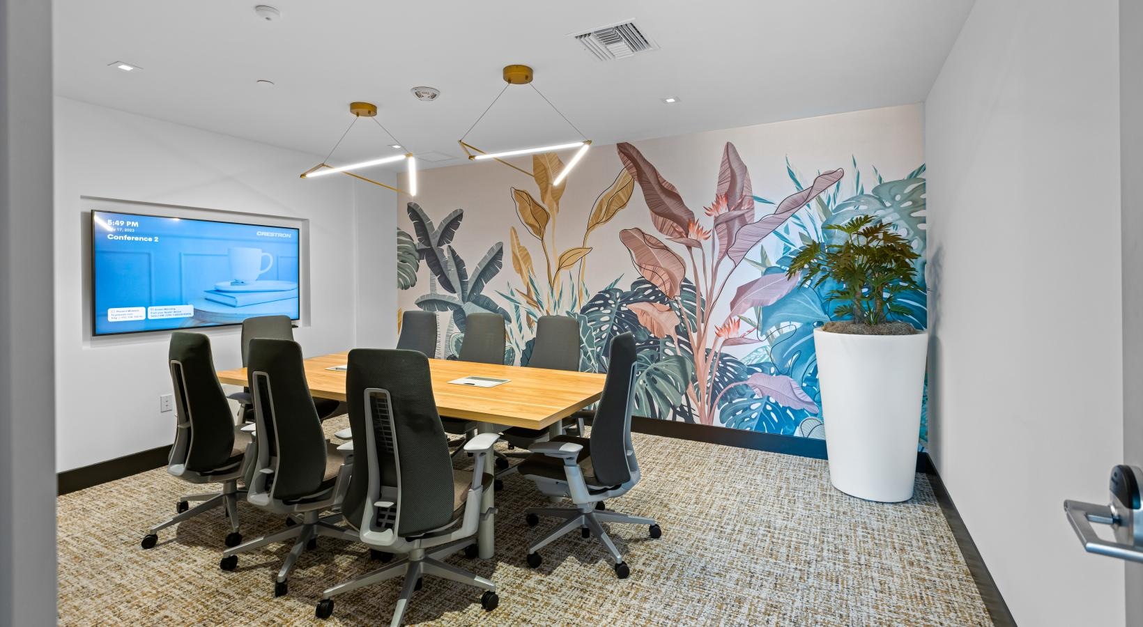 Enjoy our resident-only features a room with a desk and chairs