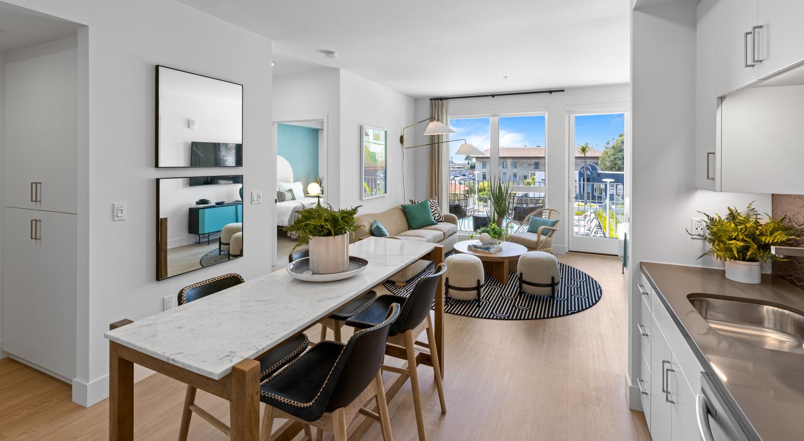 Settle into comfort at Winslow a kitchen with a dining table