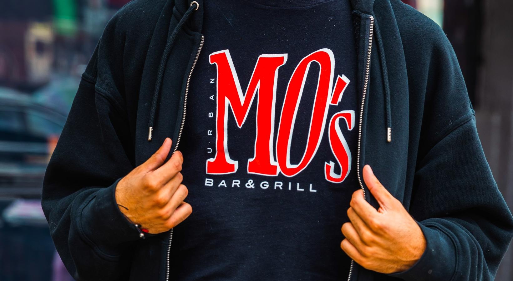 The essence of exceptional living a man wearing a hoodie