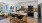a kitchen with a table and chairs