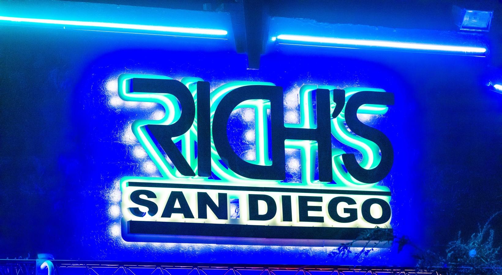 Settle into comfort at Winslow a neon sign with blue lights