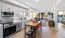 a kitchen with a table and chairs