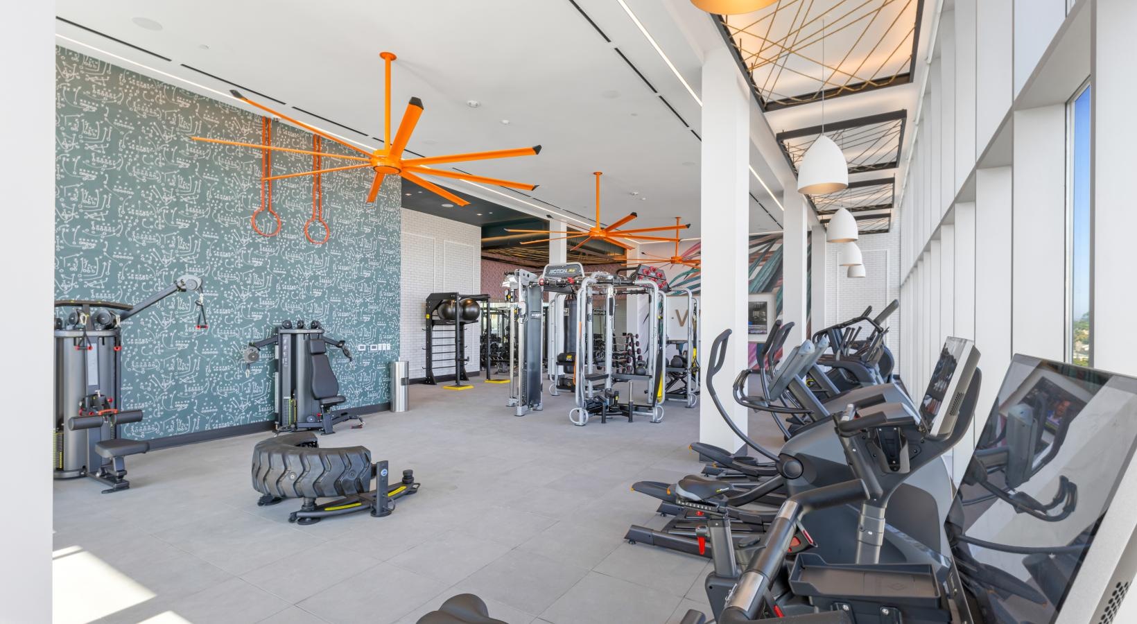 Cutting-edge amenities at your fingertips a room with exercise equipment