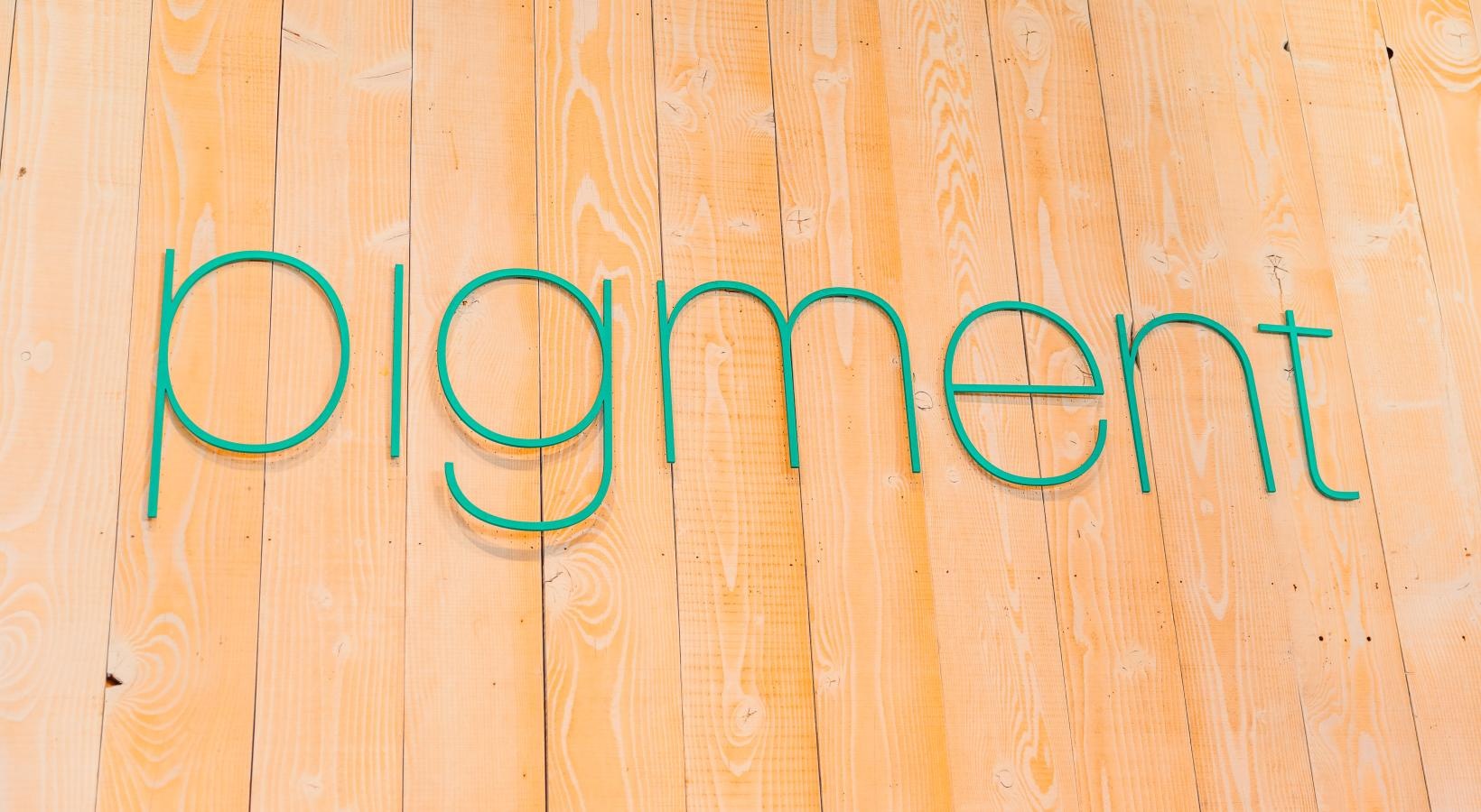 Settle into comfort at Winslow a green sign on a wood surface