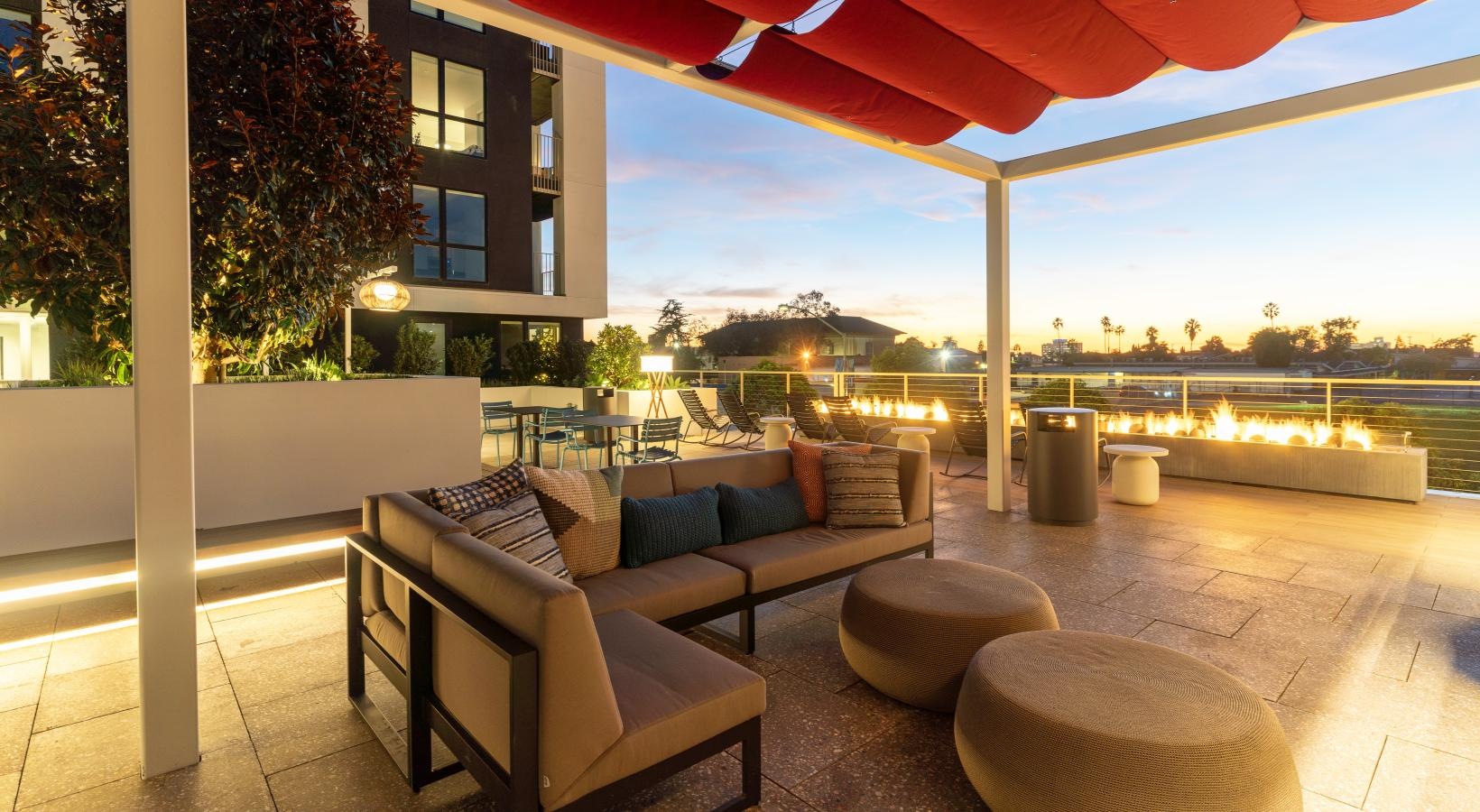 Enjoy our resident-only features a patio with a table and chairs