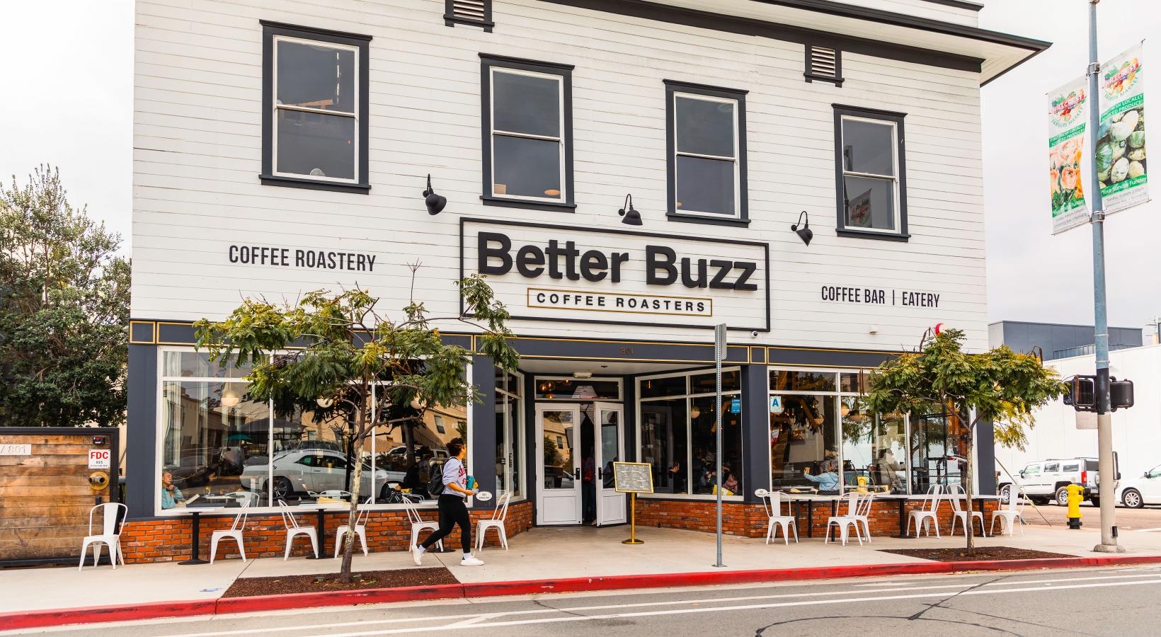 Find your perfect fit at Winslow a building with tables and chairs outside